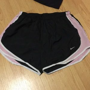 Black and light pink running shorts